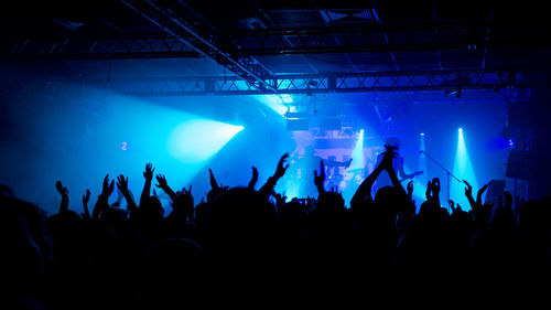 Silhouette crowd at music concert