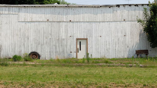 Old wooden structure on field