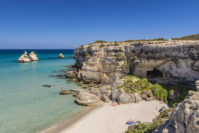 Scenic view of sea against clear blue sky