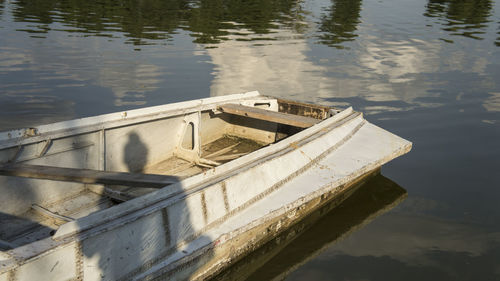 High angle view of abandoned boat moored in lake