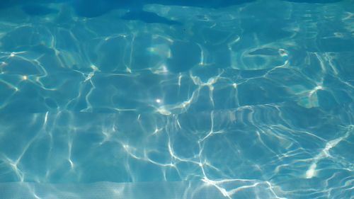 Solar glare on the water in the pool.