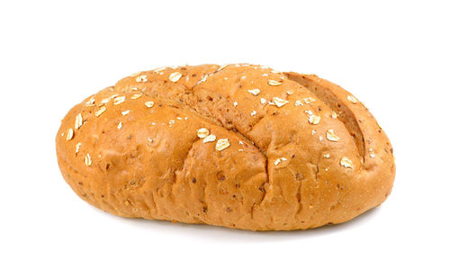 Close-up of bread against white background