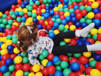 High angle view of girl playing with ball