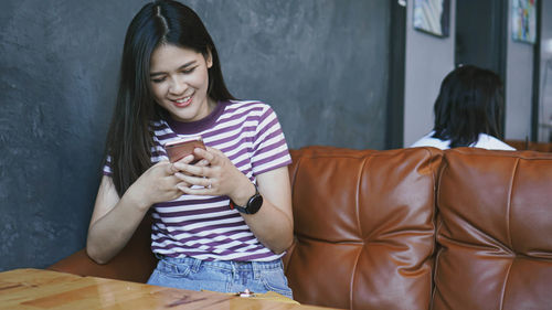 Happy woman looking at camera