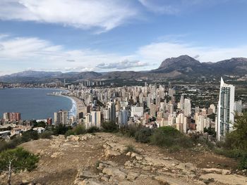 High angle view of buildings in city against sky