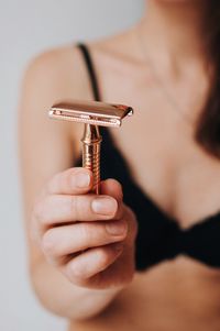 Woman body part with safety shaving razor