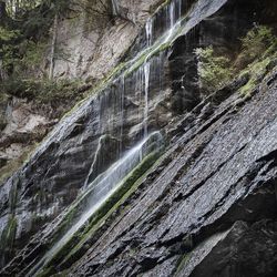 Full frame shot of water flowing through rocks