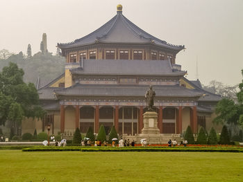 Group of people in front of building