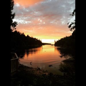 Scenic view of sea against sky at sunset