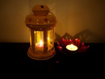 Close-up of lit tea light candle