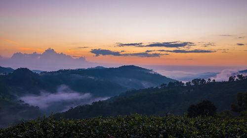 Scenic view of mountains against sky during sunset