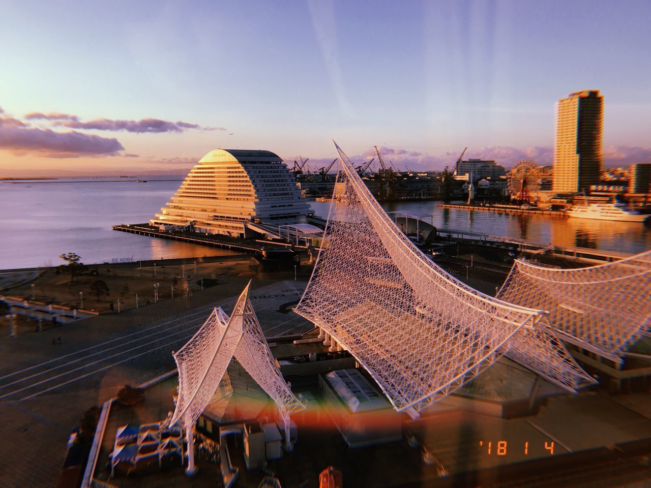 architecture, built structure, sky, sunset, building exterior, city, dusk, outdoors, skyscraper, travel destinations, cityscape, day, water, no people, nature