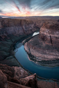 Scenic view of rock formation against sky during sunset