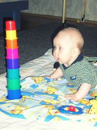 Close-up of cute boy looking away