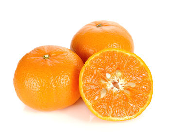 Close-up of oranges against white background