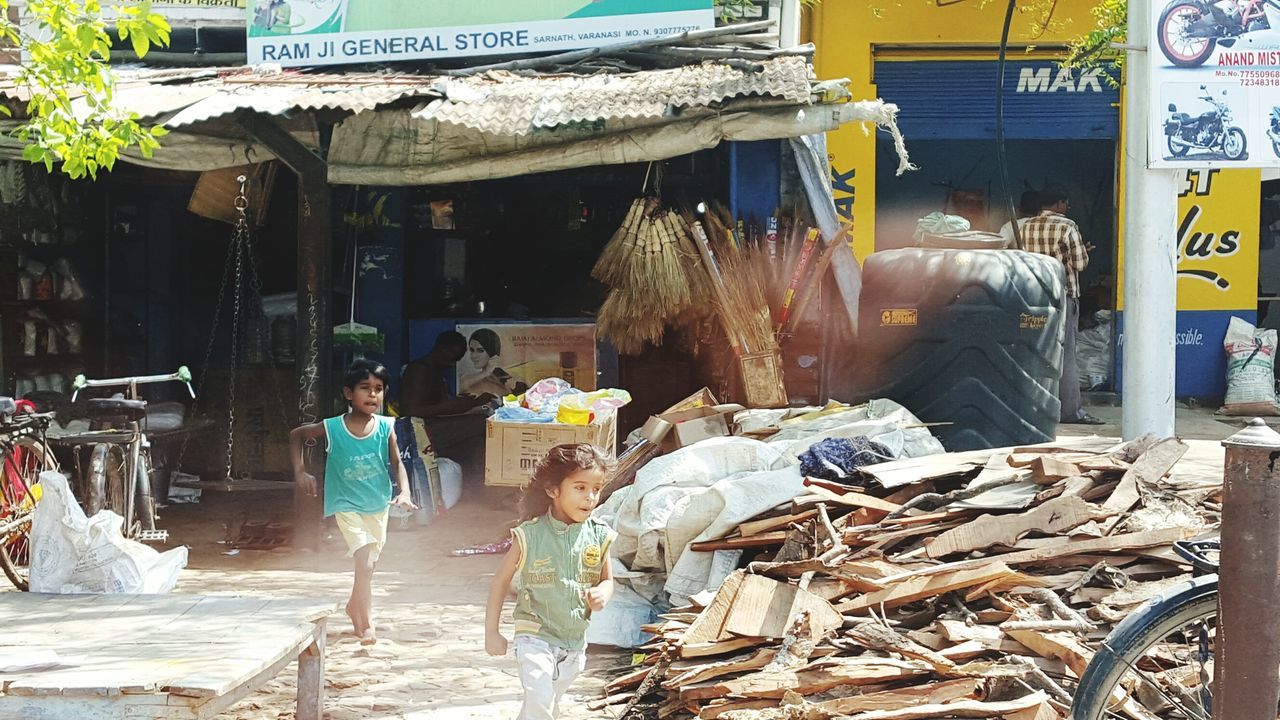 men, lifestyles, occupation, full length, working, person, rear view, messy, casual clothing, day, leisure activity, building exterior, built structure, outdoors, market, animal themes, garbage