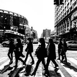 People walking on city street