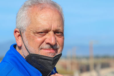 Portrait of man wearing sunglasses outdoors