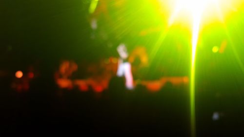 Low angle view of people at night