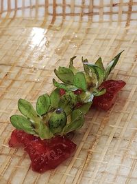 High angle view of strawberries on table