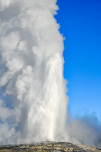 View of smoke against cloudy sky