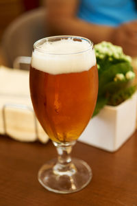 Close-up of beer in glass on table