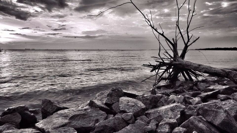 sky, water, sea, cloud - sky, tranquility, tranquil scene, rock - object, horizon over water, scenics, beauty in nature, nature, cloudy, cloud, stone - object, beach, shore, idyllic, rock, rippled, stone