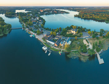 High angle view of sea and buildings in city