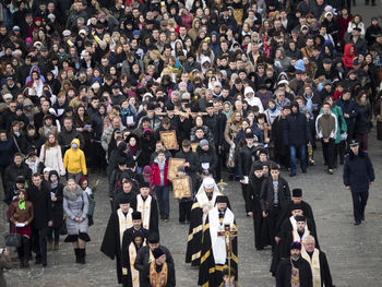 High angle view of crowd in procession on street during palm sunday