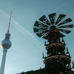 Low angle view of fernsehturm tower against sky