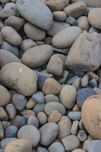 Full frame shot of pebbles on beach