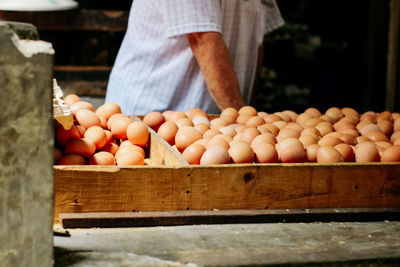 Pumpkins in crate at market stall