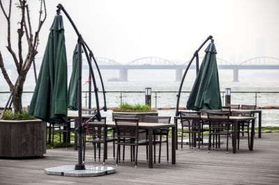 Outdoor cafe by han river against sky