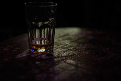 Close-up of beer glass on table