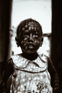 Portrait of young woman looking away