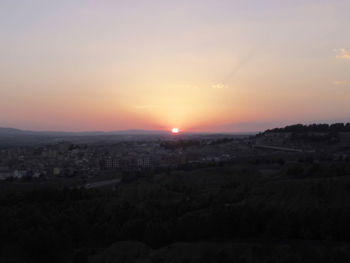 Scenic view of landscape against sky during sunset