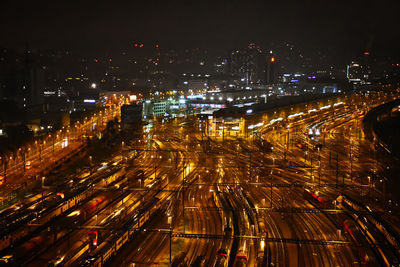 High angle view of illuminated cityscape at night