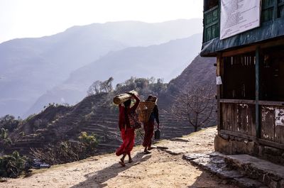 Woman standing on mountain