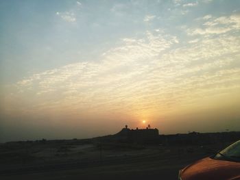 Scenic view of sunset against sky