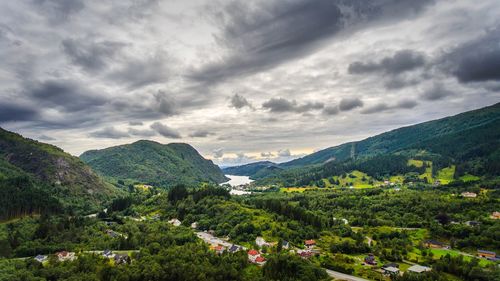 High angle view of trees and mountains against sky