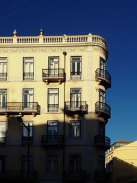 Low angle view of building against blue sky