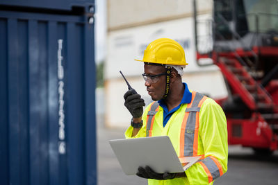 Man working with umbrella