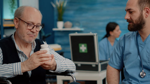 Doctor consulting patient at hospital