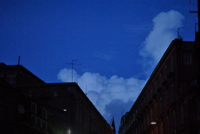 Low angle view of building against blue sky