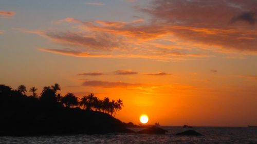 Silhouette of beach at sunset