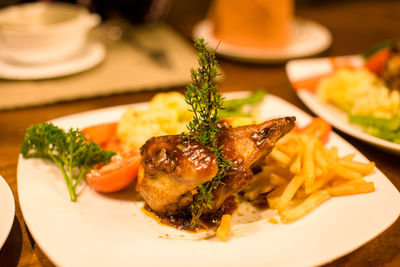 Close-up of food served on table