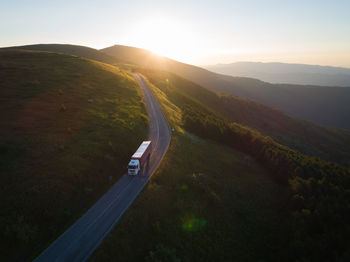 Scenic view of mountains against sky during sunset