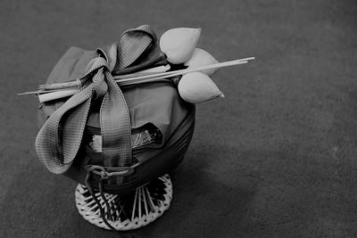 High angle view of toy in basket on table