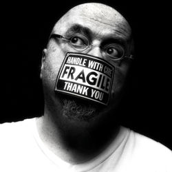 Close-up portrait of mid adult man