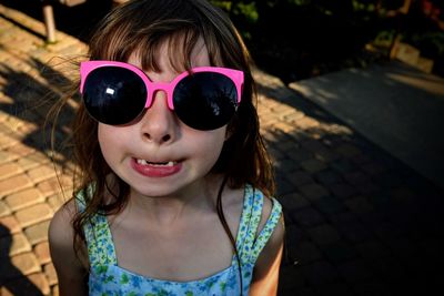 Portrait of cute girl wearing sunglasses